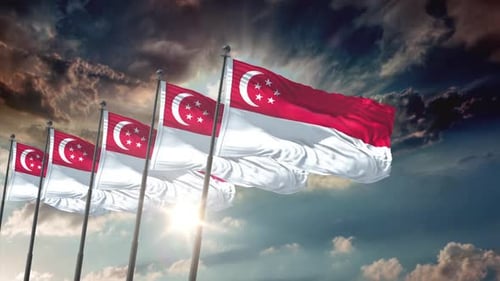 Multiple Singapore Flags Waving in Wind with Sun Rays