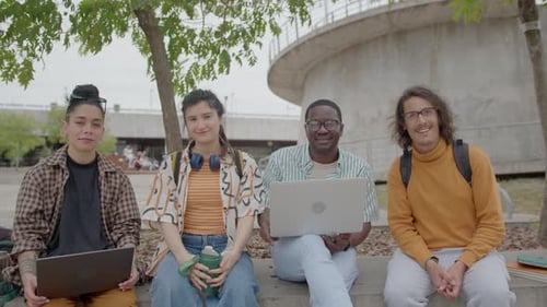 Group Portrait of Happy College Students Outdoors in the Park