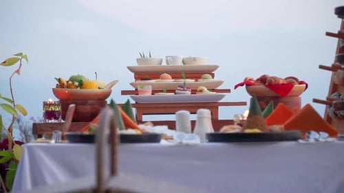 Tropical Brunch Served on Table Near Beach