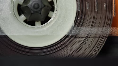 Audio Cassette Reel Spinning Close Up