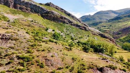 Aerial View of Serene Mountain Valley Landscape