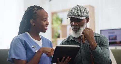 Discussion, tablet and caregiver with senior man in living room of nursing home for medical