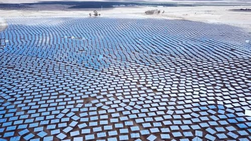 Solar power plant mirrors that focus sun rays upon a collector producing renewable energy