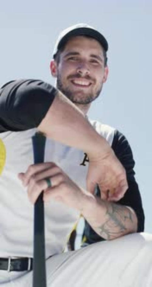 Face, man and baseball player with bat for sports, fitness and happiness with match training