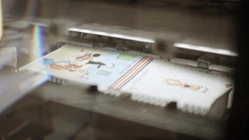 Machine Prints Paper With Illustrations And Artwork