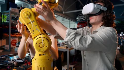 Young Adults Control Robotic Arm with VR Headsets