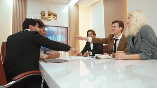 Group of diverse office worker join hand together in ornamented office room