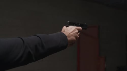 Person Training Gun Shooting at indoor Range