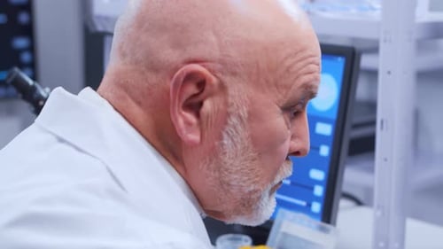 Senior Scientist Working in Modern Lab