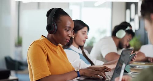 Woman, students and headphones with laptop in library for education, studying
