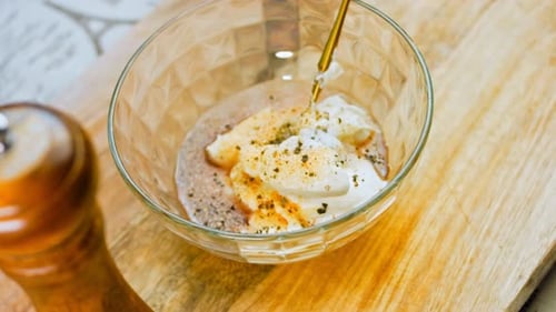 The Process of Mixing Mayonnaise and Onions