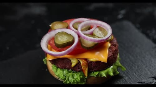 chef prepares hamburgers in the kitchen. vegan cutlet