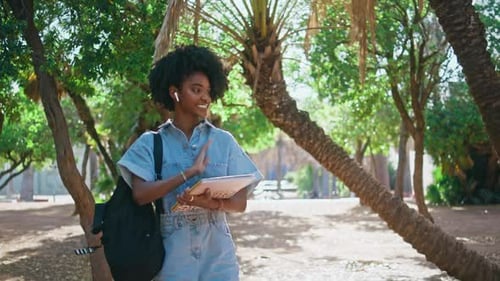 Teen Girl Walking Campus College Holding Books Closeup Student Greeting Friends