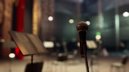Elegant Microphone with Music Stand on Empty Concert Stage