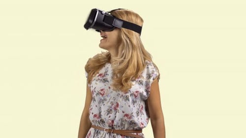 Woman Wearing VR Headset Experiencing Virtual Reality