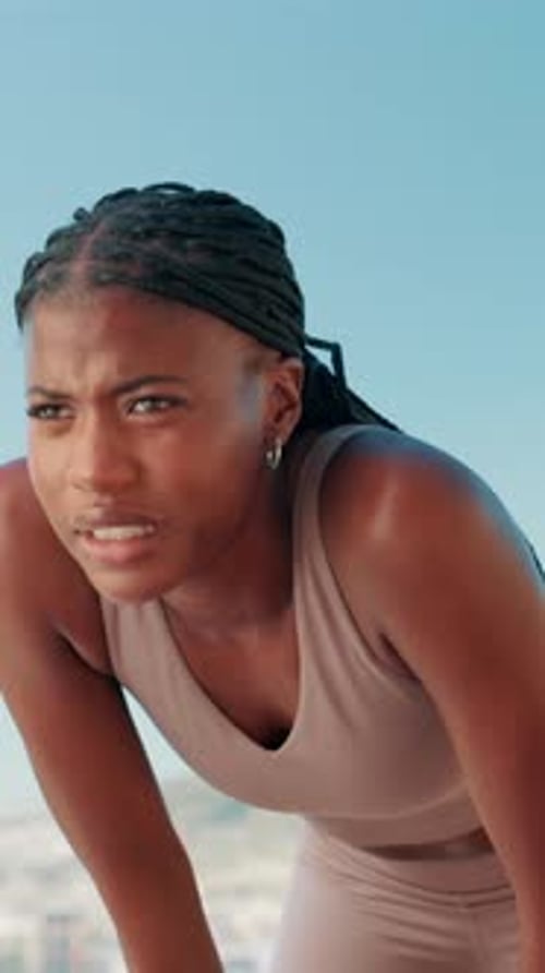 Fitness, black woman and tired with breathing in city for exercise fatigue