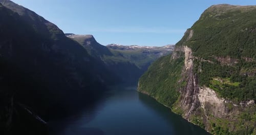 Cinematic Establishing Aerial View Above Geirangerfjord, Seven Sisters Waterfall. Summer in Norway