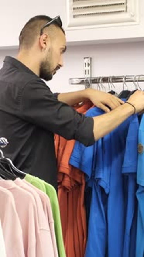 Man Choosing Tshirt