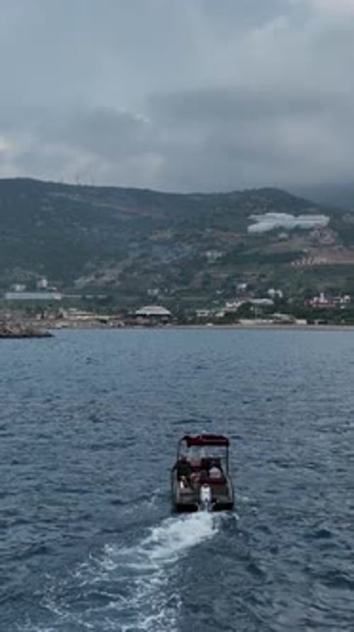 Vertical Video Fishing By Sunrise Small Boat Excursion in the Mediterranean