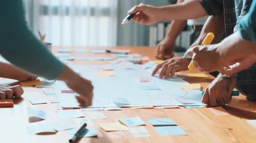 Collaborative Team Brainstorming with Sticky Notes and Markers