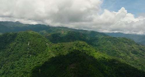 Aerial View of Mountain Covered By Rainforest