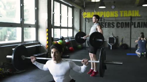 Modern Gym Workout with Heavy Barbells