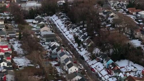 Aerial View of Snow Covered Suburban Neighborhood