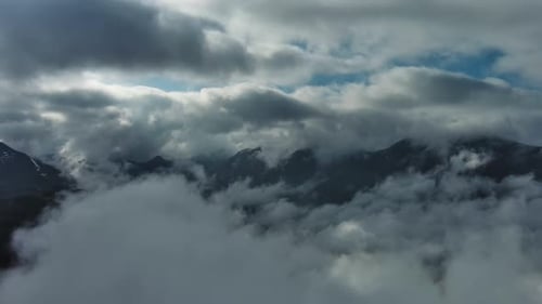 Aerial High View of Dramatic Clouds Flying