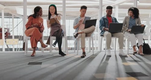 Group of Young Adults Collaborating in Bright Modern Office