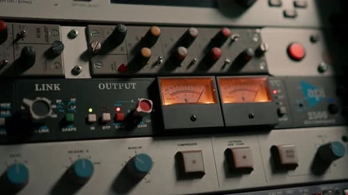 old displays of professional analog vu meters in a recording studio measuring and showing decibels