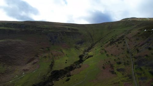 Aerial view of mountainous green valley at Brecon Beacons National Park, Wales, UK