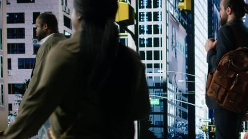 Diverse Pedestrians Crowd Crossing Street During Morning Commute