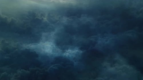POV from above cumulonimbus clouds in the sky moving during a thunderstorm