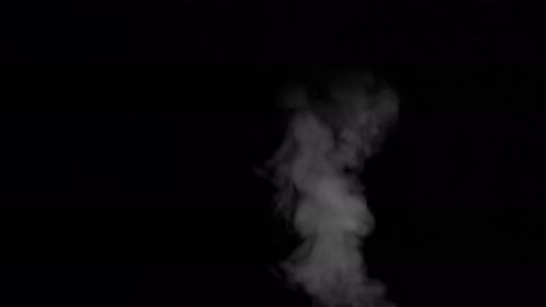 Steam Stream Closeup Isolated On Black Background