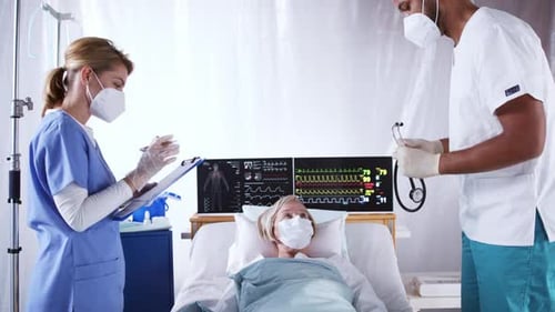 Doctors and Covid-19 Infected Patient in Bed in Hospital, Coronavirus Concept