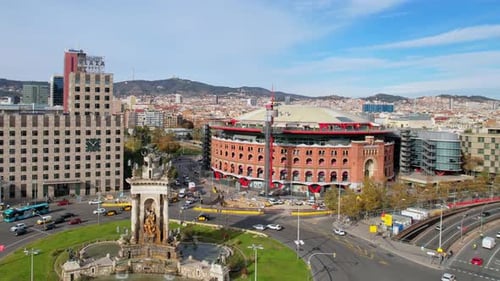Panoramic aerial drone view of city traffic Plaza de Espana of Squares in Barcelona