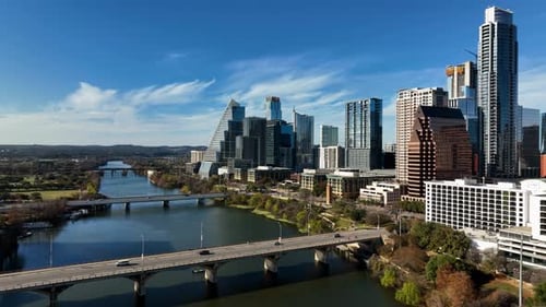 Descending Aerial view of traffic on the Congress Avenue Bridge, fall in Austin, Texas, USA