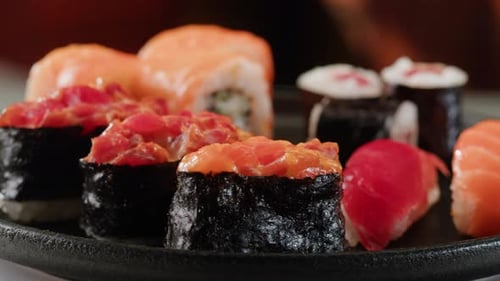 Sushi Sashimi Nigiri Platter Japanese Gunkan Maki Sushi Restaurant Fresh Tuna and Salmon Slices in