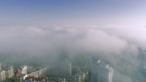 Aerial Birds Eye View of Kyiv City Urban Futuristic Skyline During Fog Skylines Under the Thick Fog