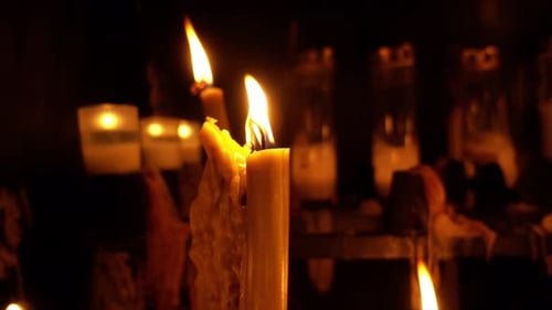 Candles burning in church Slow Motion