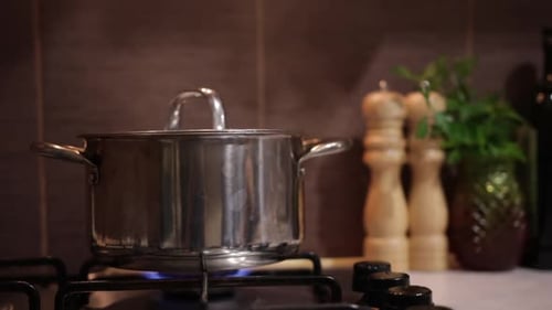 Smoke Billowing From a Steaming Pot - Close Up
