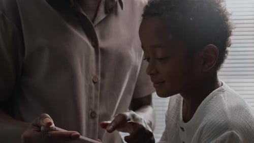 Mother and Child Bonding Over a Mobile Device