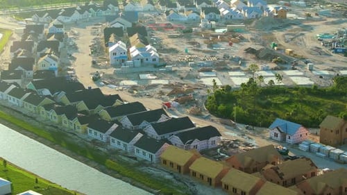 Top View of Wooden Houses Under Construction in New Developing Suburban Area Development of