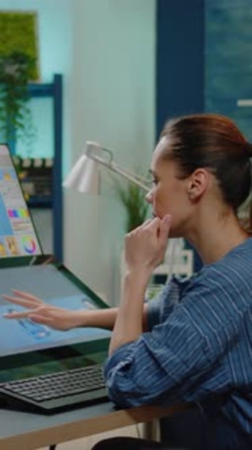 Vertical Video Retouch Specialist Doing Editing Work on Pictures in Office Studio