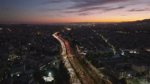 City Traffic Time Lapse Sunset Over the Glowing Urban Highway
