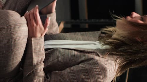 Vertical Video Detectives Analyze Evidence in Office