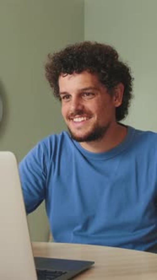 Happy Man on Video Call At Home