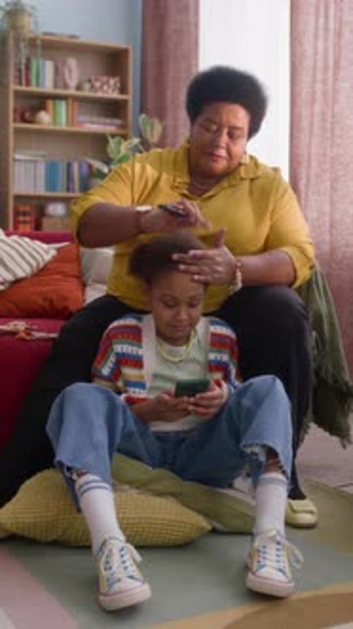 Brushing Child's Hair Indoors At Home