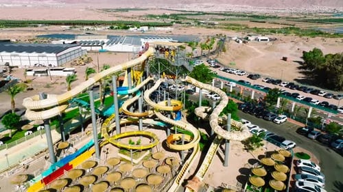 Aerial video over Eilot, the Yo Splash water park, residences and slides, a place of recreation