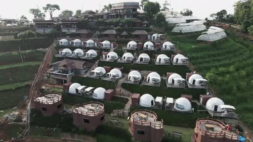 Hillside Full of Modern White Prefabricated Houses Seen From the Top in Monjam